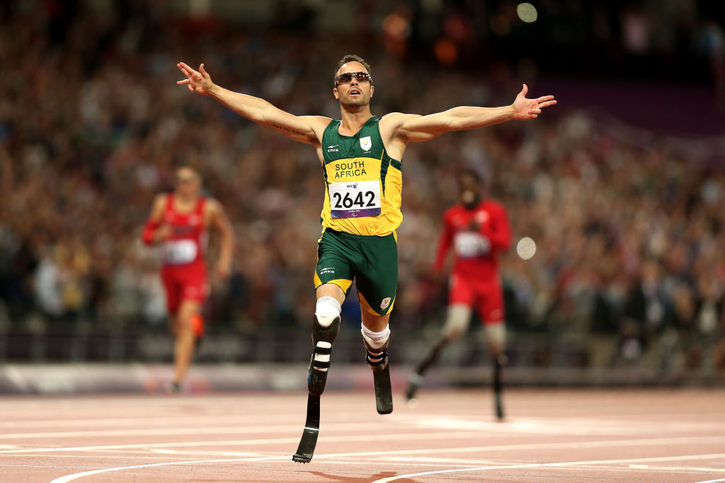 LONDON, ENGLAND - SEPTEMBER 08: Oscar Pistorius of South Africa celebrates as he wins gold in the Men's 400m T44 Final on day 10 of the London 2012 Paralympic Games at Olympic Stadium on September 8, 2012 in London, England.